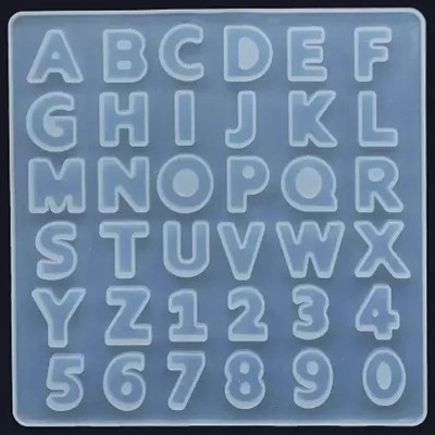 Silicon Mold - SILICOMOLDS - SILICONE ALPHABET MOLD FRONT POURING PLAIN-  URP202-RM Manufacturer from Mumbai