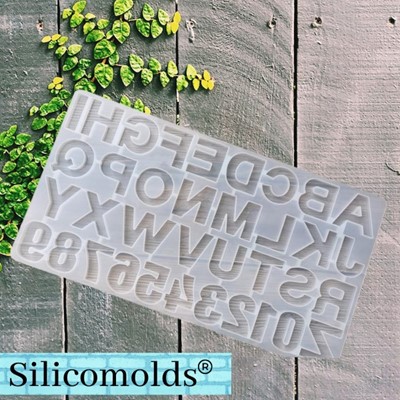 Silicon Mold - SILICOMOLDS - SILICONE ALPHABET MOLD FRONT POURING PLAIN-  URP202-RM Manufacturer from Mumbai